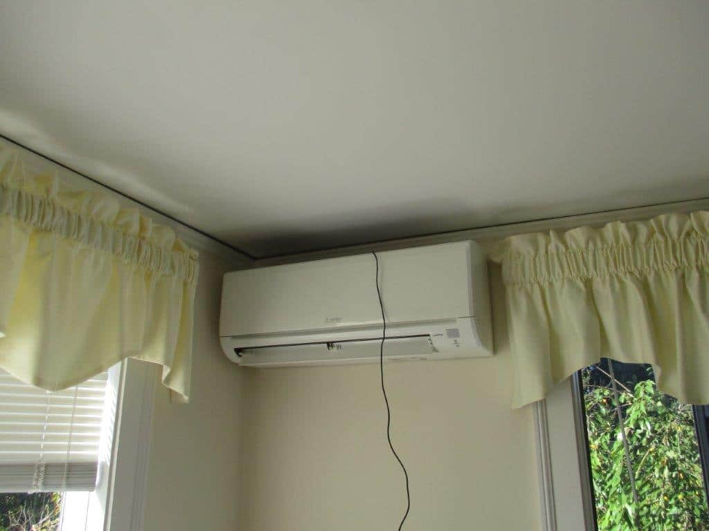 Mitsubishi ductless unit installation in Bedford, MA cape home