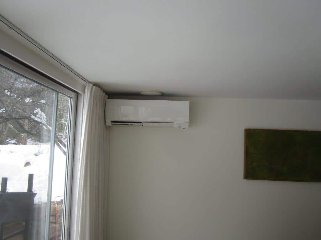 Concord MA contemporary living room is finally comfortable with Mitsubishi ductless heating and cooling