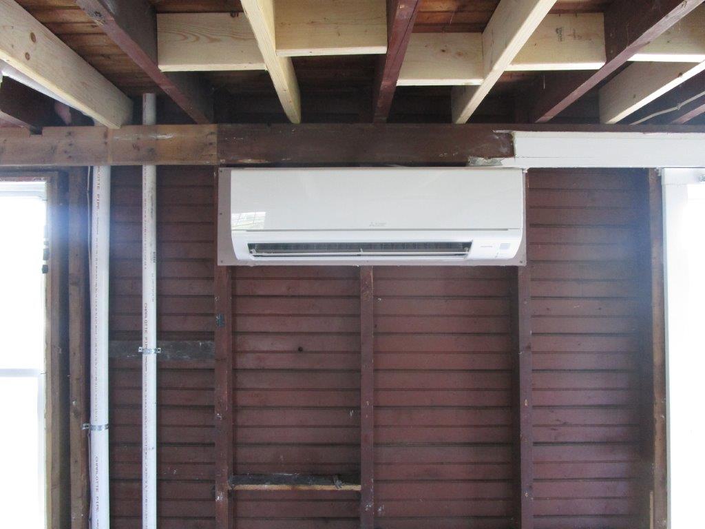 Mitsubishi ductless AC example of indoor wall unit installation.