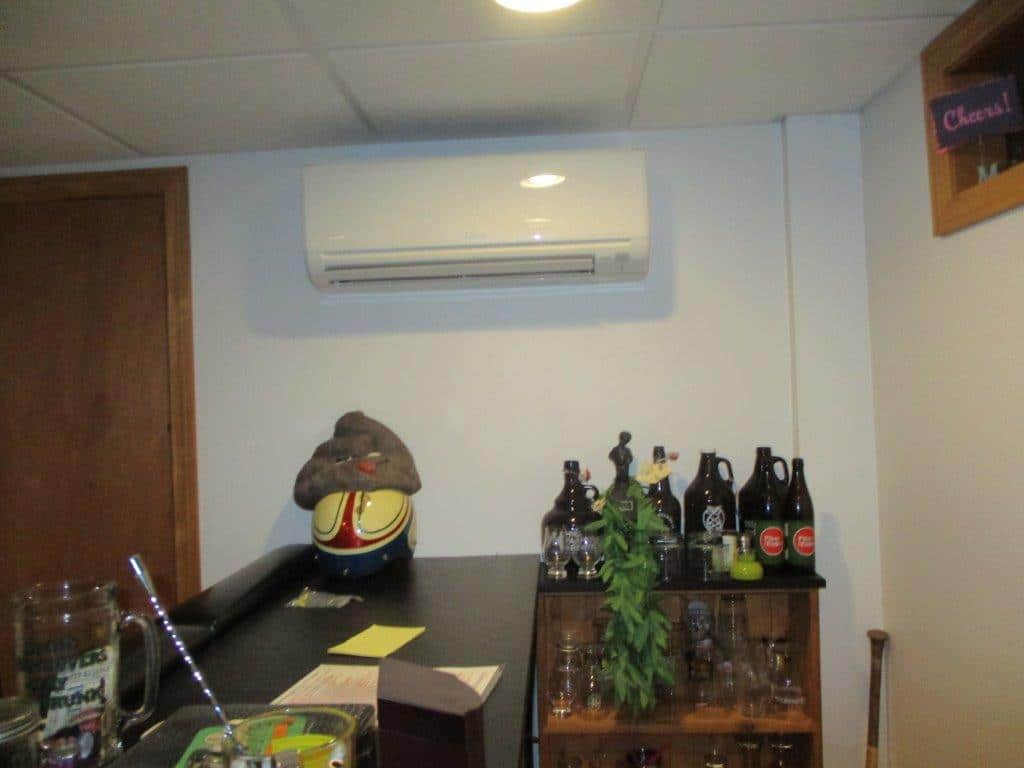 A finished basement in Methuen, MA with a new Mitsubishi ductless unit