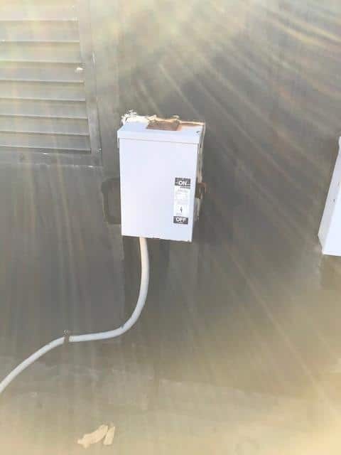 Control panel for rooftop heating unit replacement in Boston Harborside, MA.