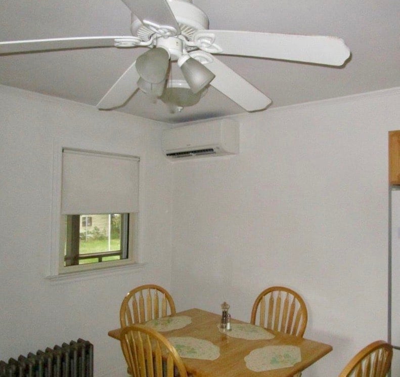 Ductless air conditioner unit installed in dining room in Danvers, MA.