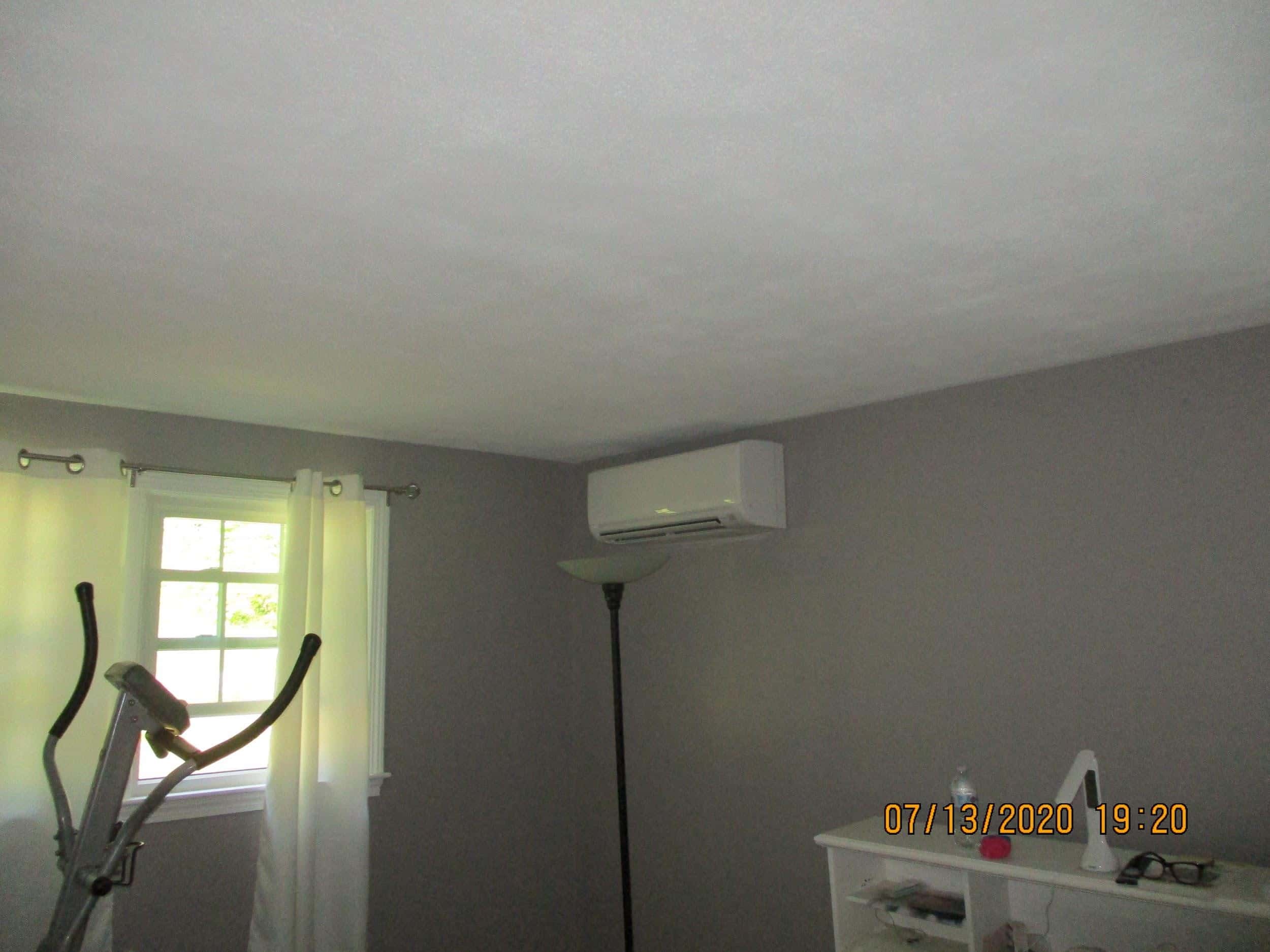 Ductless AC installed in Framingham, MA, split-level home. 