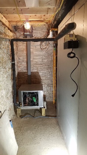 ERV installation in basement for updated HVAC system in Andover, MA.