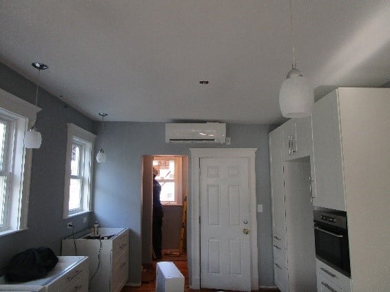 Example of indoor wall ductless AC in Somerville condo.