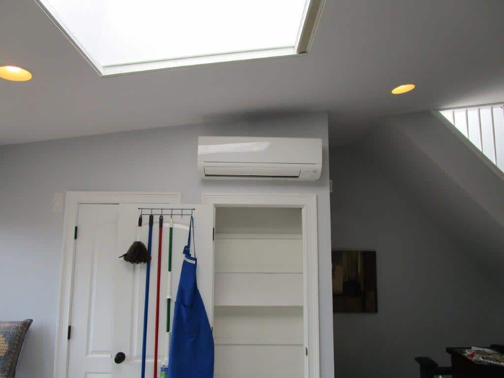 Indoor installation of ductless heating and air unit.