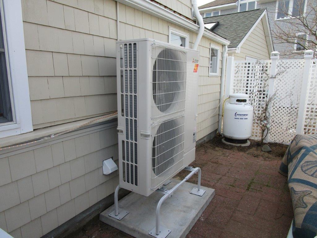 Outdoor condenser installed in Newburyport for mini-split ductless multi-zoned system.