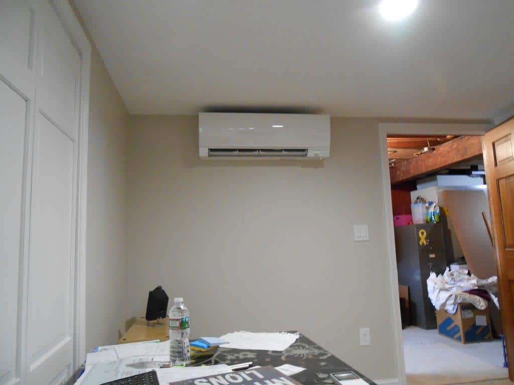 An HVAC unit provides ductless air conditioning in Beverly, MA ranch basement