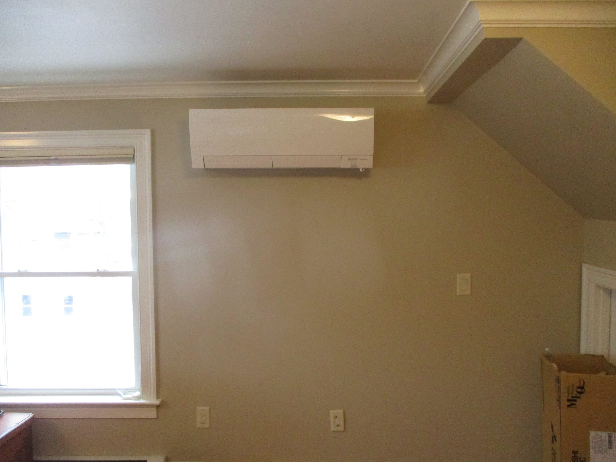 Indoor Mitsubishi ductless AC installed in Roslindale home.