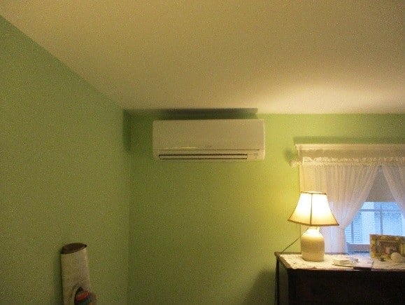 Indoor ductless AC with heat pump in West Roxbury bedroom.