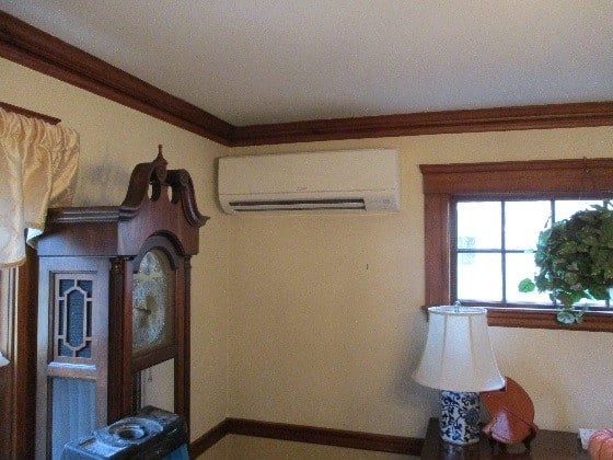 Indoor installation of wall AC with heat pump in West Roxbury.