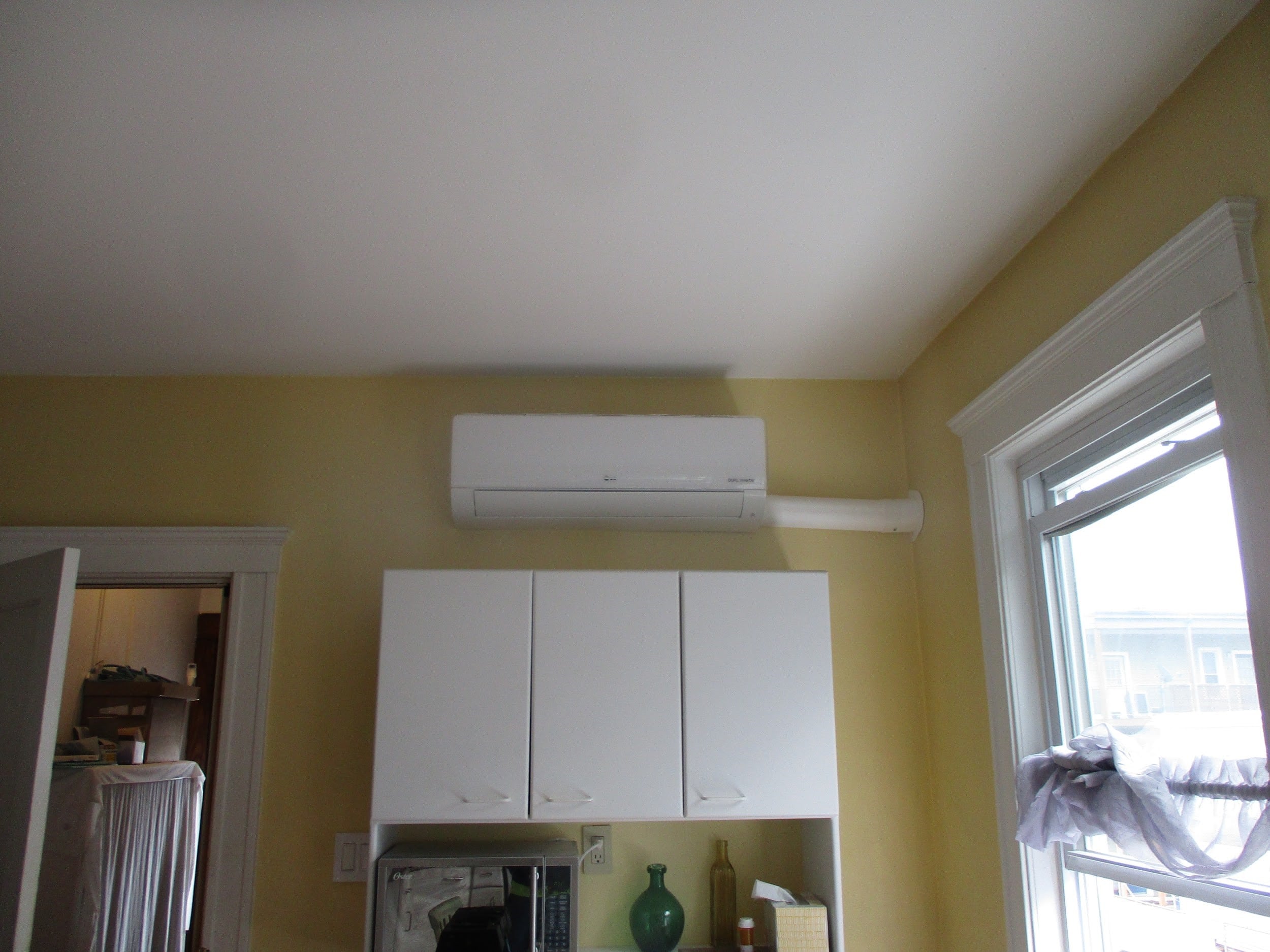 LG ductless wall AC installed in Cambridge apartment.