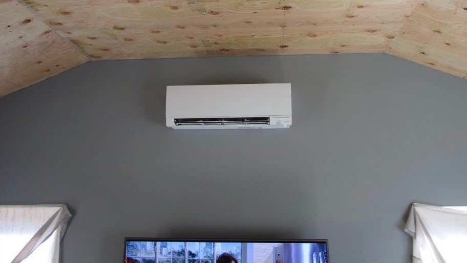 Wall mounted ductless AC unit installed in Peabody, MA, home.