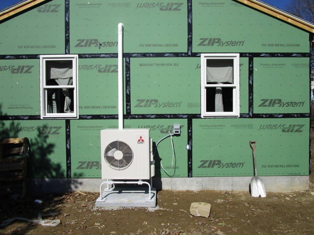 Outdoor heat pump and condenser for ductless system installed in Peabody, MA.