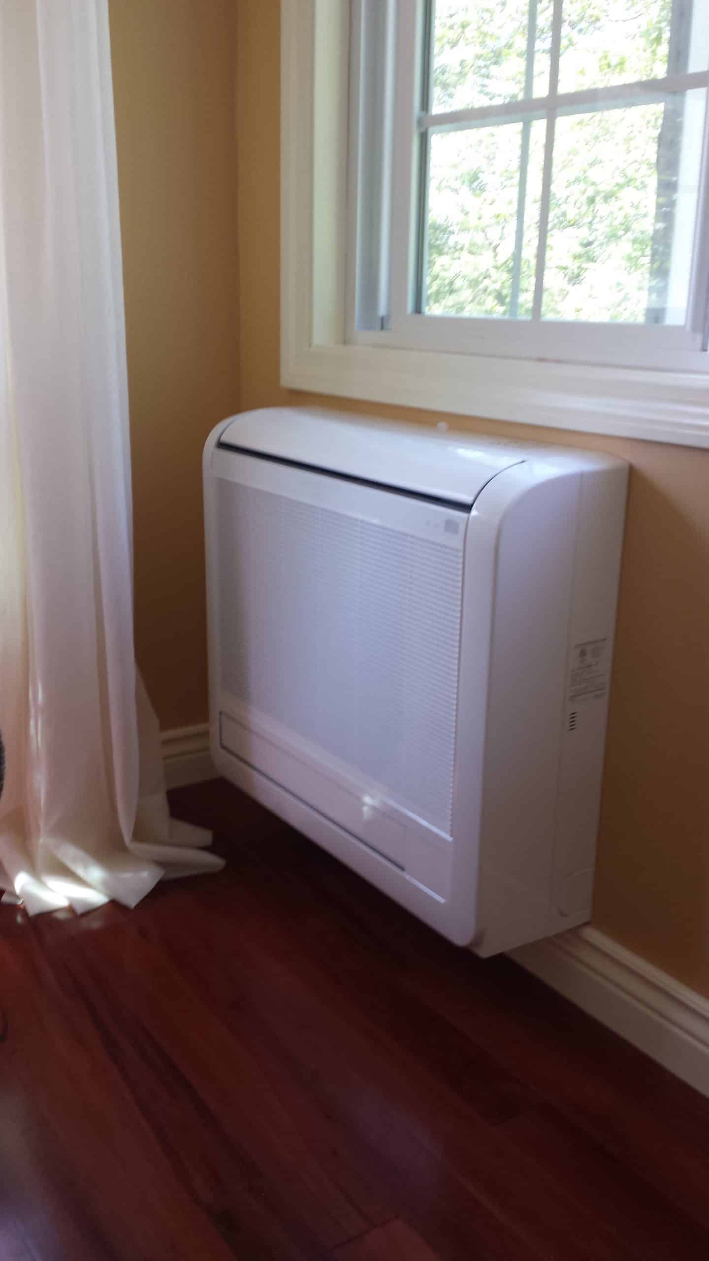 Mitsubishi ductless split system HVAC unit inside Woburn, MA home