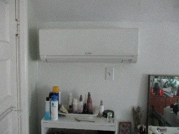 Mitsubishi ductless air conditioner mounted in Somerville, MA, home.