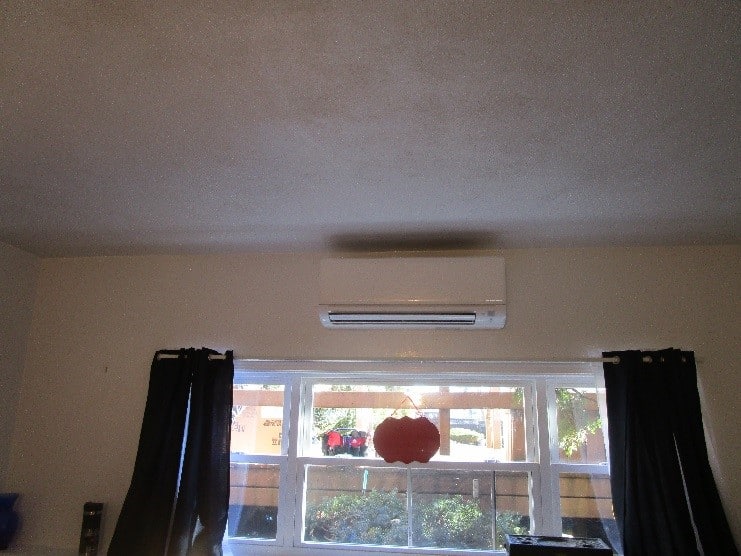 Example of Mitsubishi ductless wall AC installed in Dorchester condo.