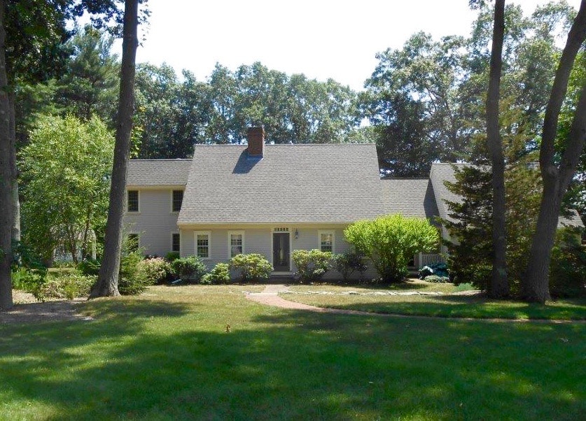 Hamilton, MA, cape-style home gets mini split ductless AC system installed.