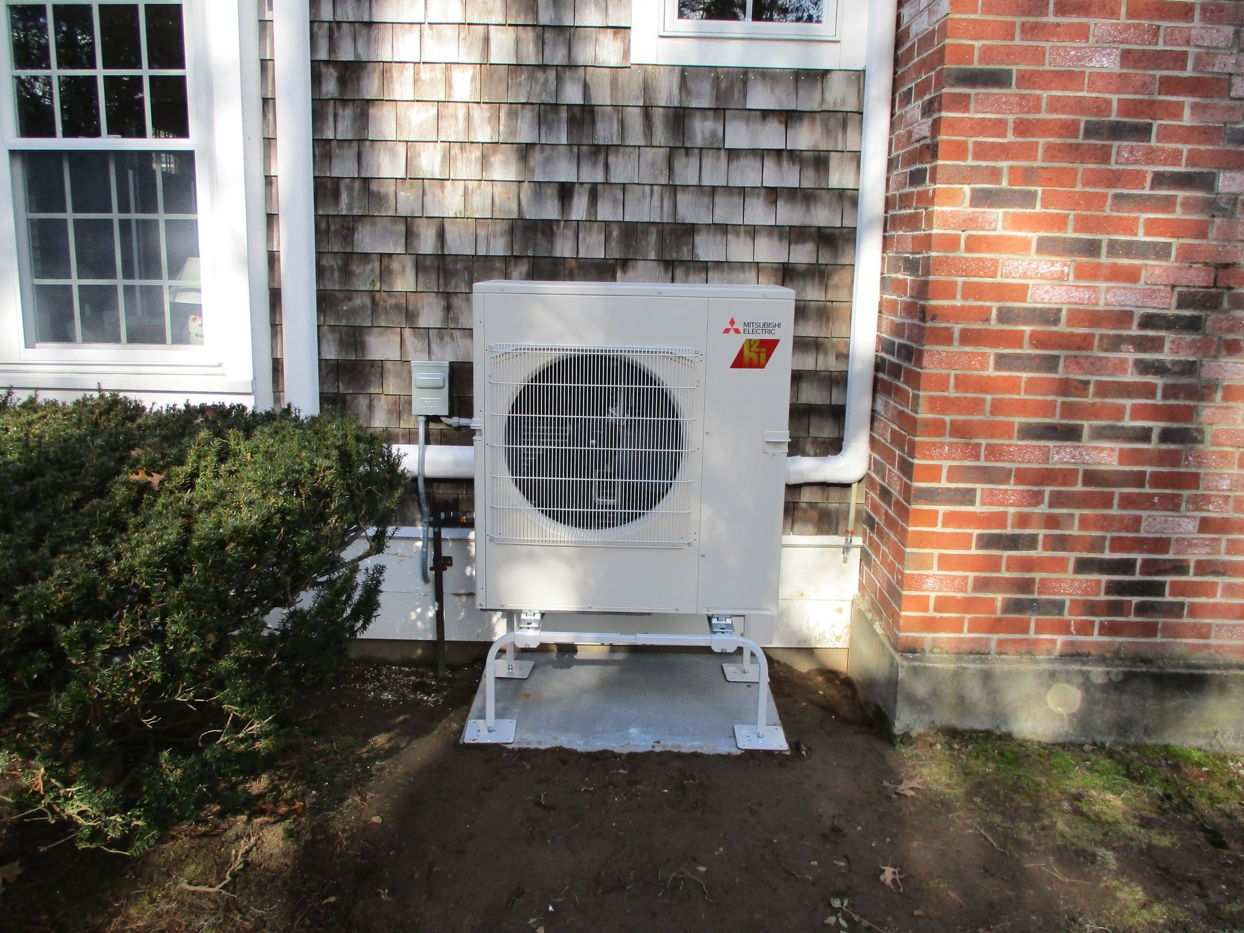 Outdoor Mitsubishi ductless air conditioner condenser unit in Duxbury, MA.