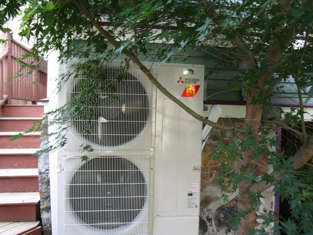 Outdoor condenser in Boston, MA, for Mitsubishi ductless system.
