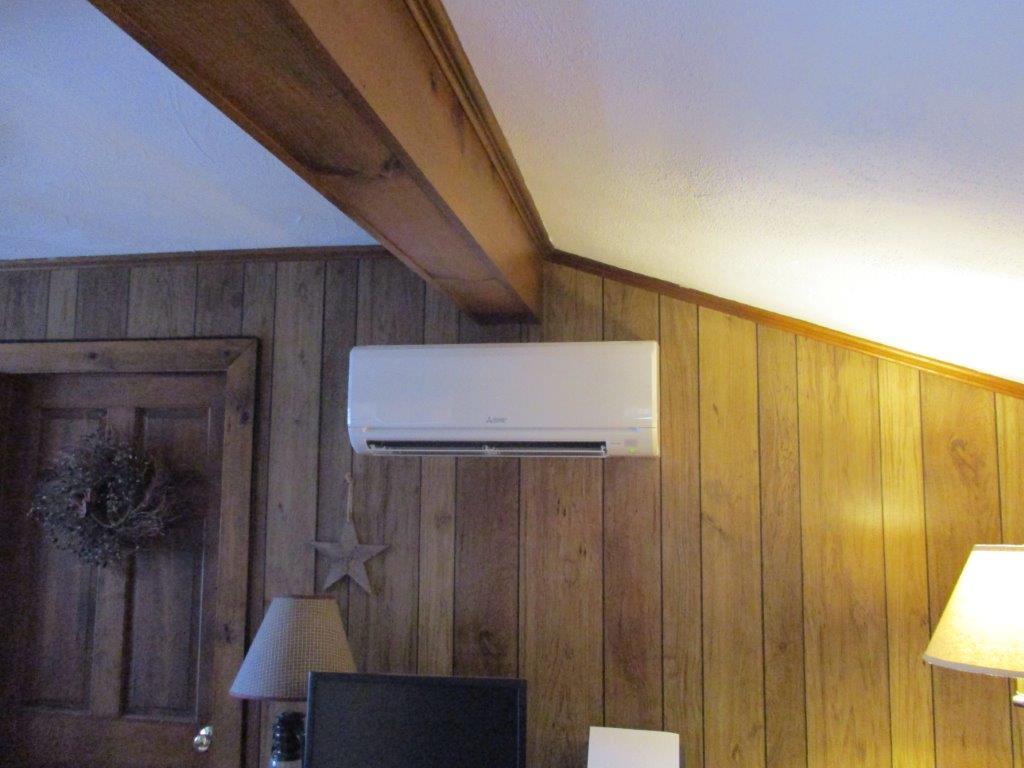 Example of a wall mounted ductless AC in Danvers ranch home.