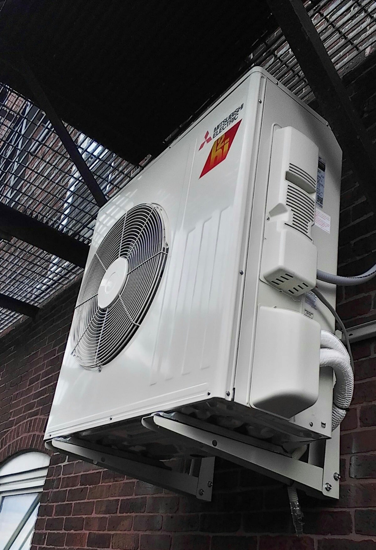 Outdoor condenser unit installed for ductless system in Boston