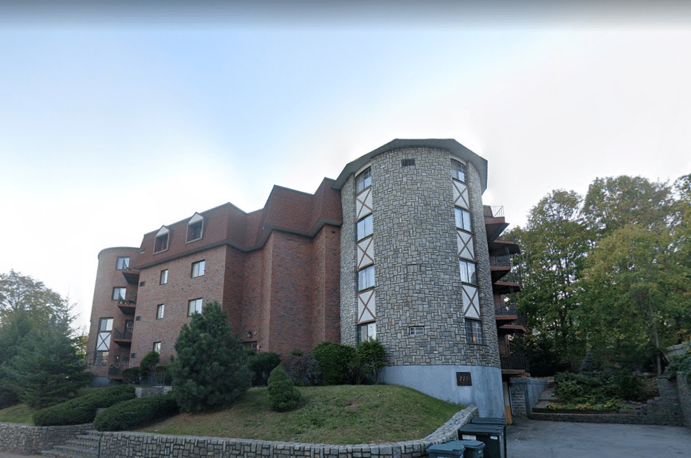 Quincy, MA, replaces electric heat and window ACs with a ductless system. 