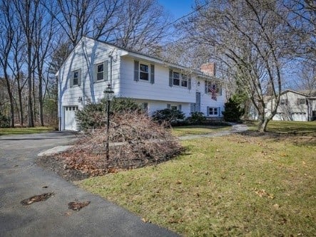 Ranch home in Andover, MA, upgrades to Mitsubishi ductless heating and cooling system.