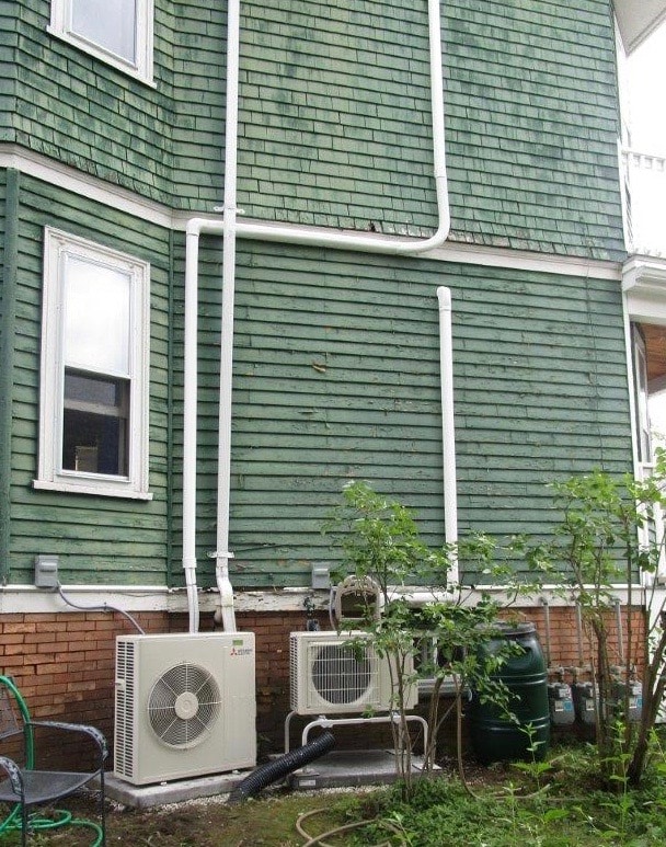 Outdoor ductless condenser unit installed in Somerville Victorian