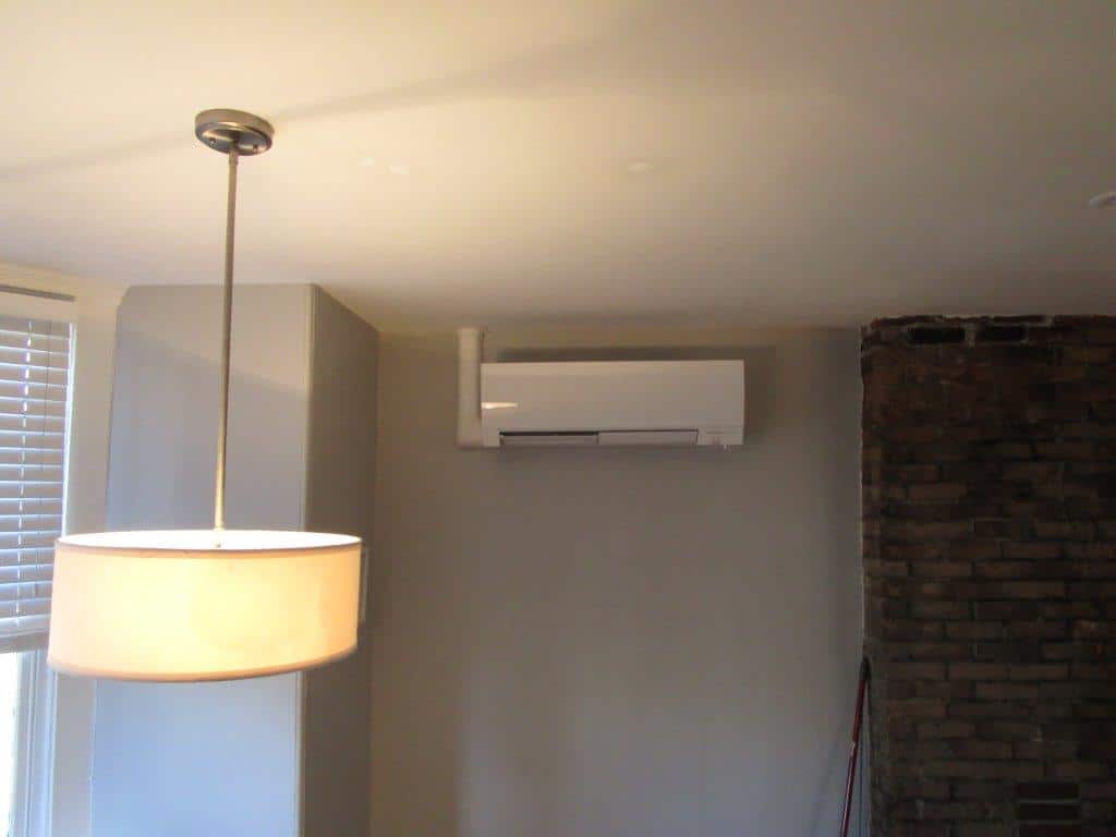 Indoor example of wall cassette installed in Boston brownstone for ductless AC