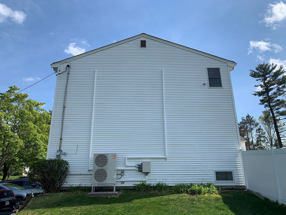 Second outdoor heat pump installed for Mitsubishi ductless system in Peabody, MA.