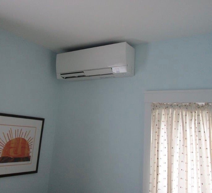 Indoor installation of ductless heat pump in Somerville home