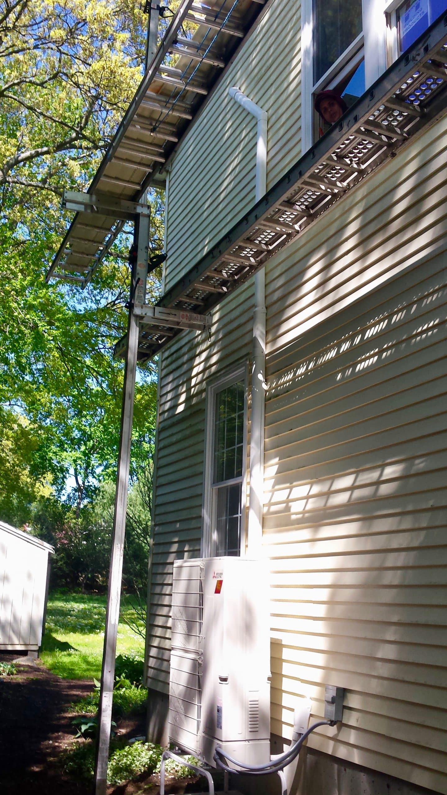 Outdoor condenser for multi-zoned ductless mini-split system in Boston area.