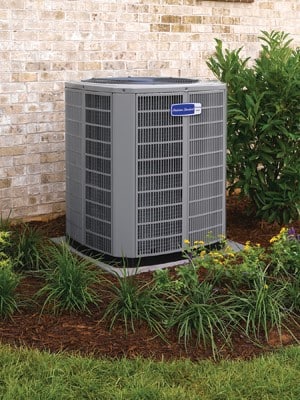 Outdoor condenser unit install in central AC upgrade for Danvers, MA, home.