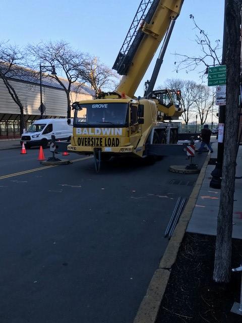 Street permit required for crane installation of a rooftop HVAC system in Boston, MA.