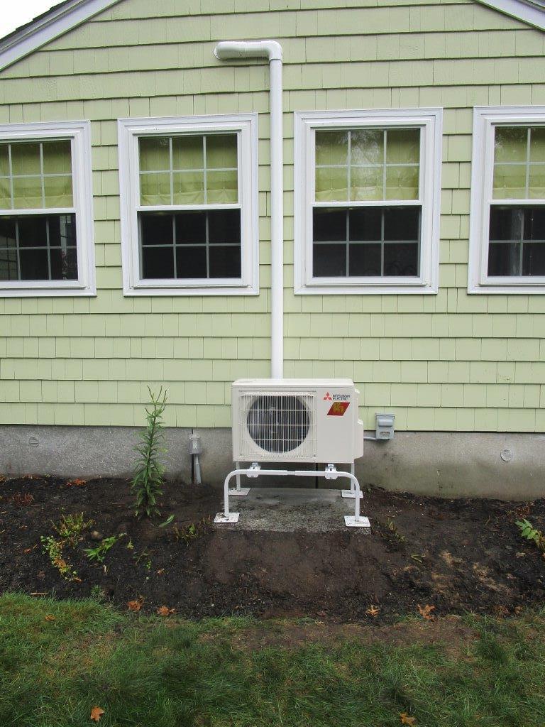 Outdoor heat pump provides heating and cooling for sunroom in Andover, MA