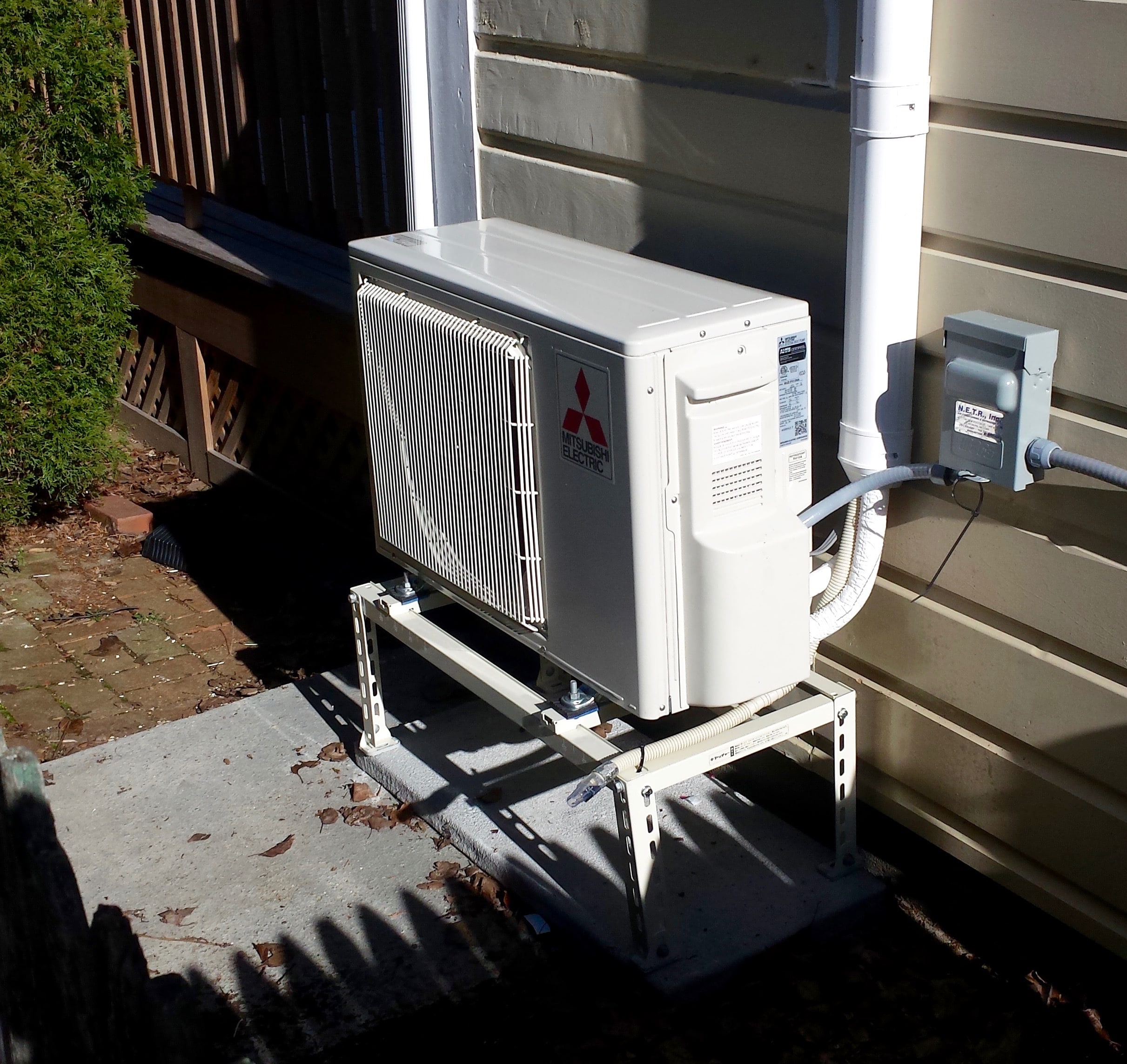 Outdoor heat pump for Mitsubishi ductless system in Rolsindale, MA.