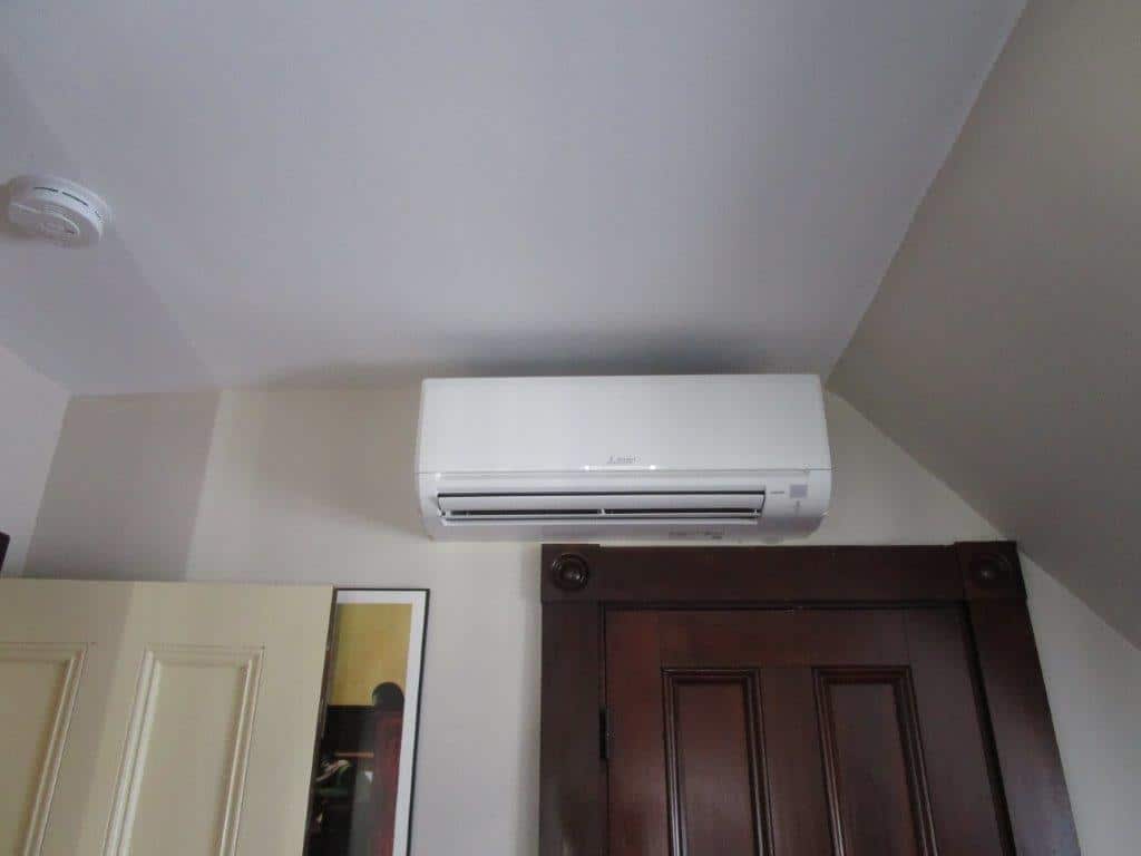 Indoor installation of ductless unit for heating and cooling in Somerville