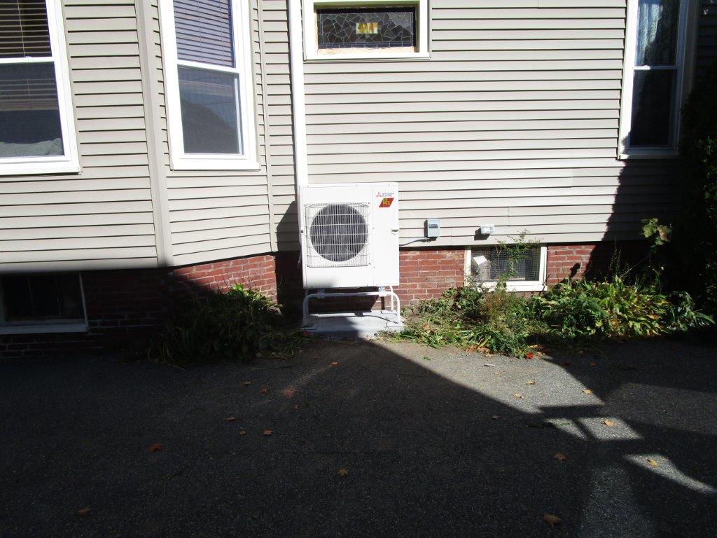 Outdoor condenser heat pump installation in Somerville