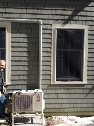 Mitsubishi outdoor heat pump condenser in Lincoln MA