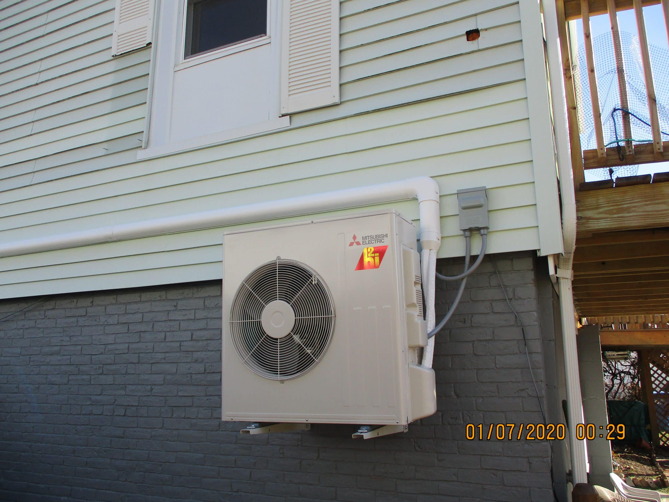 Outdoor condenser unit installed in Somerville, MA.