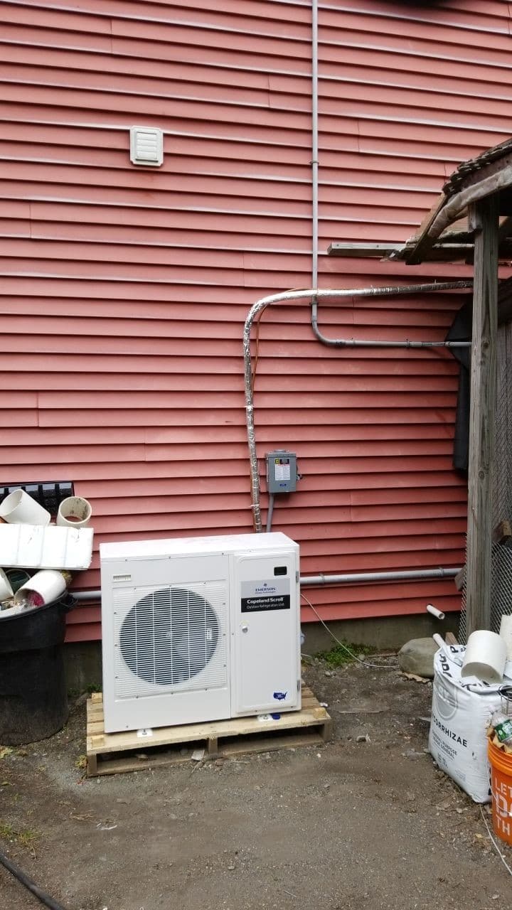 Example of an improperly installed condenser unit for a commercial refrigeration system.