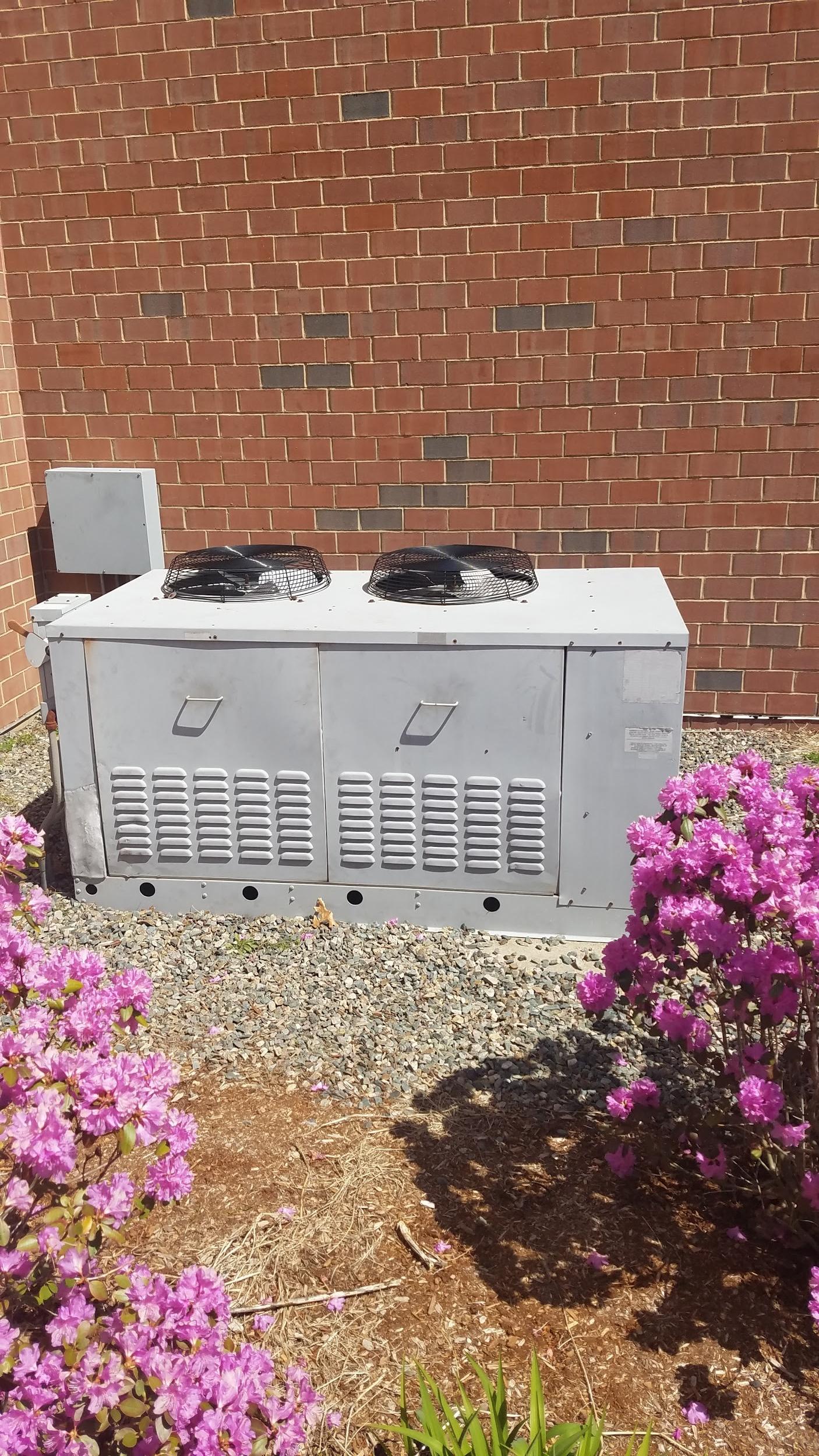 Westwood High School gets an outdoor condenser unit upgraded for cafeteria walk-in cooler system. 