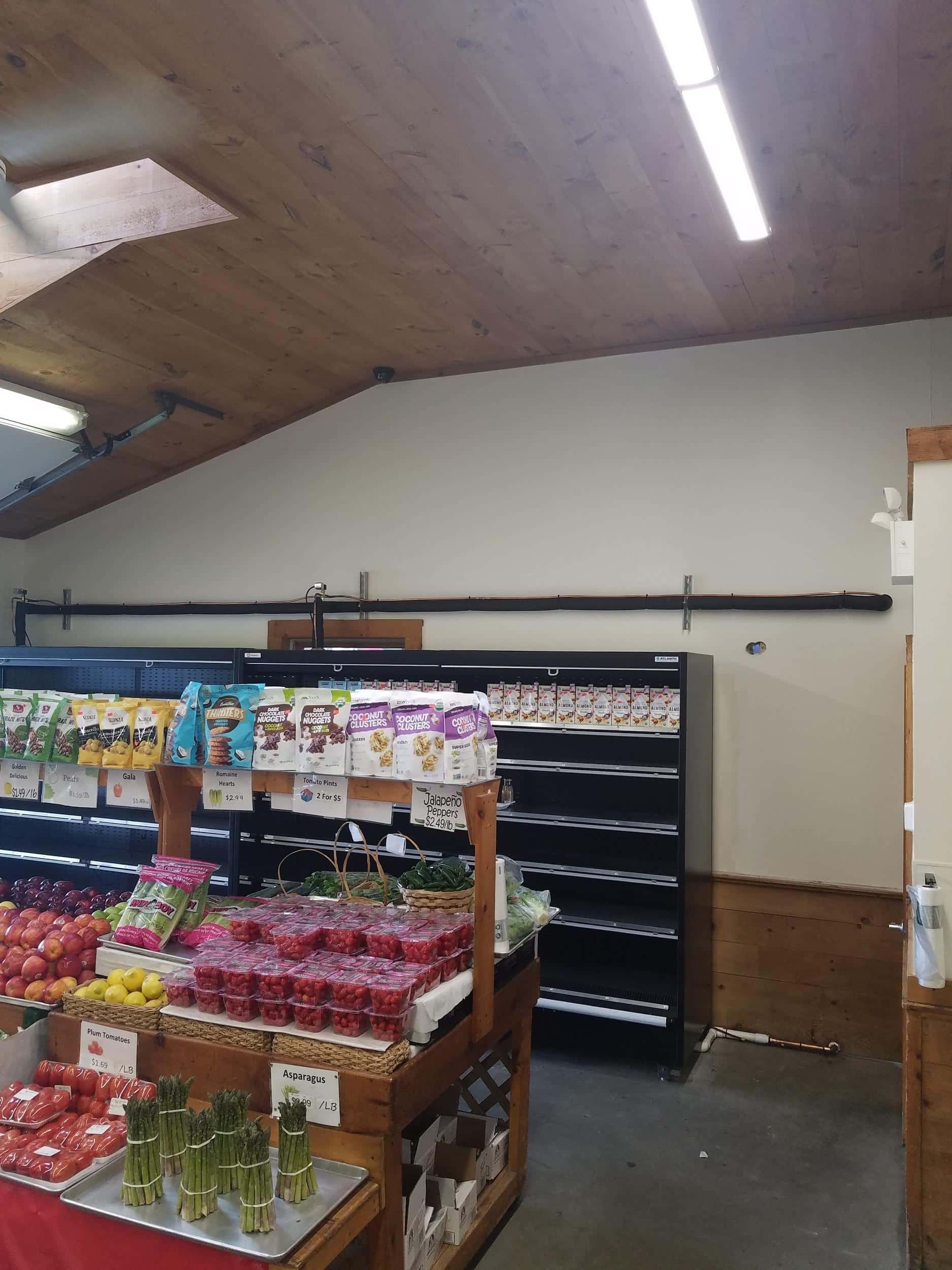 Example of how the refrigeration case and new piping looks inside the store.