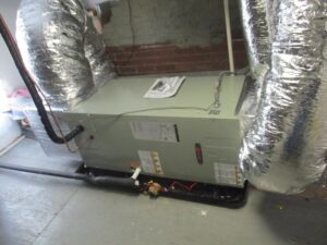 An example of an American Standard indoor air handler installed in an AC replacement in Colonial home.