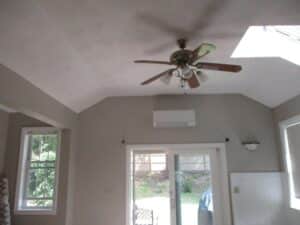 Example of an indoor Mitsubishi ductless AC unit installed in a home in Marblehead, MA, for heating and cooling. 