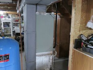 Example of an indoor two-ton 13 Seer air handler installed in a home in Danvers, MA.