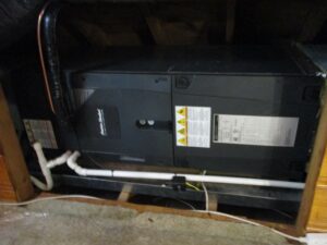 Indoor air handler for American Standard air conditioning system in Lowell, MA.