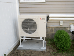 A Mitsubishi Electric ductless AC system outdoor condenser unit installed for ductless AC system in Winthrop. 