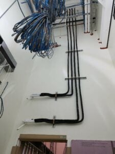 Refrigerant piping installed for the cooling system in Moderna electrical room.